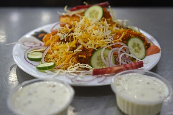 巴基斯坦比亚尼饭:辛辣的食谱，美味的辩论