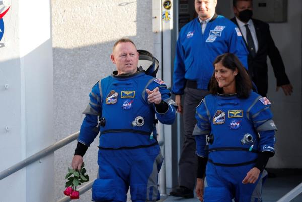 Nasa astro<em></em>nauts Butch Wilmore and Suni Williams walk at Nasa’s Kennedy Space Center, ahead of Boeing's Starliner-1 Crew Flight Test (CFT) mission on a United Launch Alliance Atlas V rocket to the Internatio<em></em>nal Space Station, in Cape Canaveral, Florida May 6, 2024. — Reuters pic  